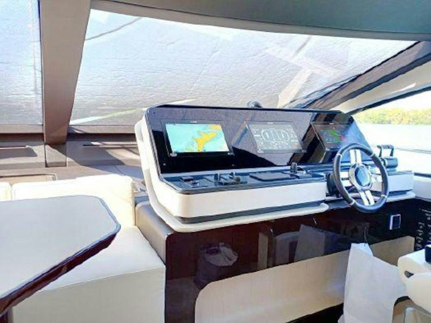 a car with a screen aboard NOMAD Yacht for Sale