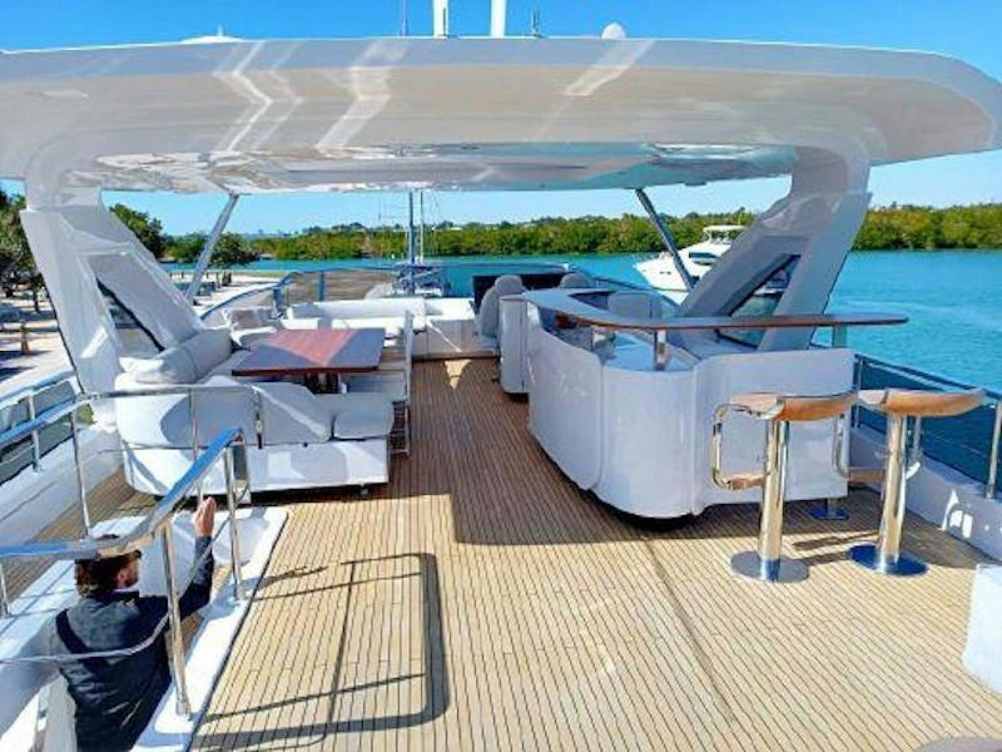 a deck with many white boats aboard NOMAD Yacht for Sale