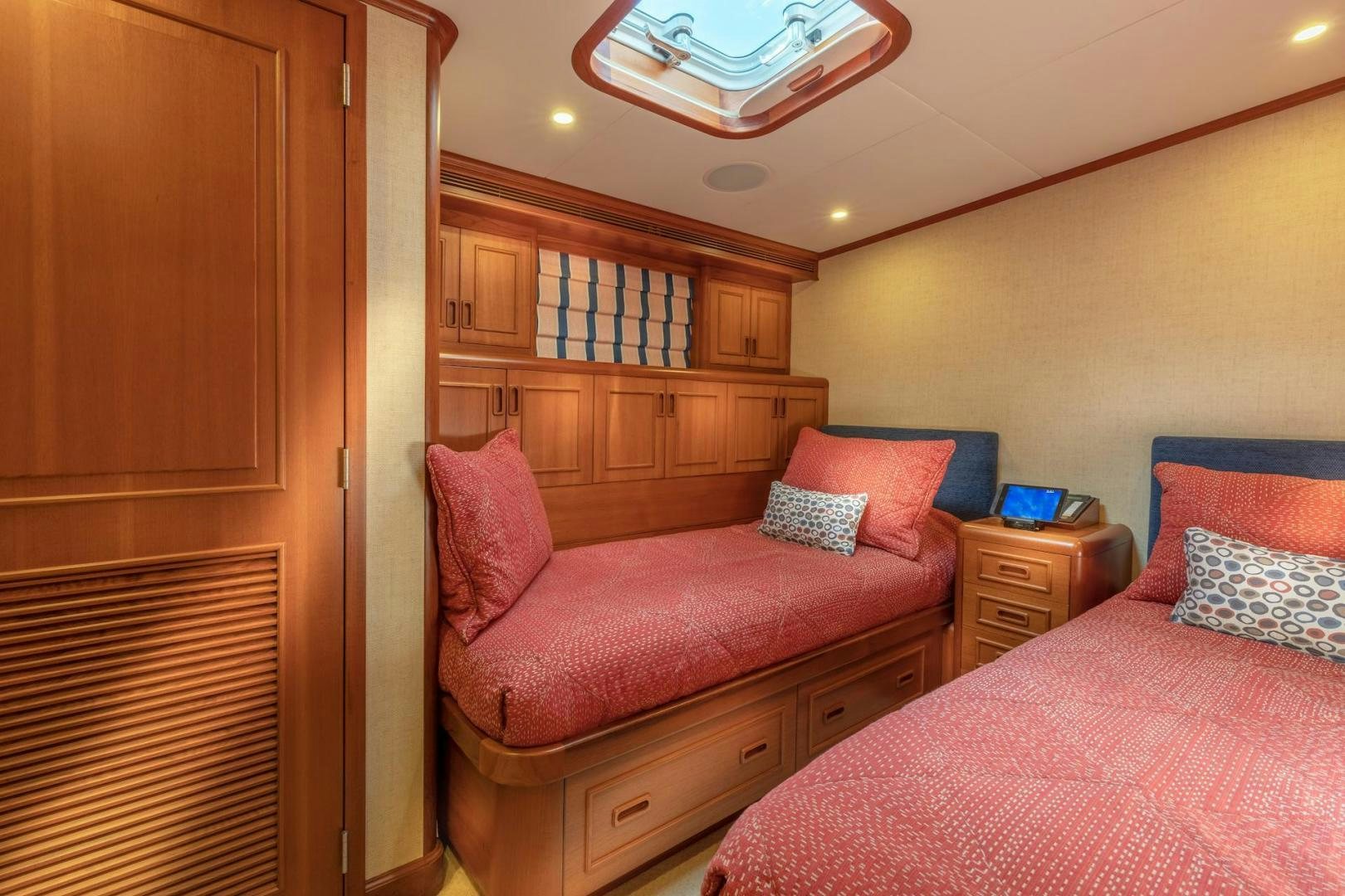 a couple of beds in a room aboard CATCH Yacht for Sale