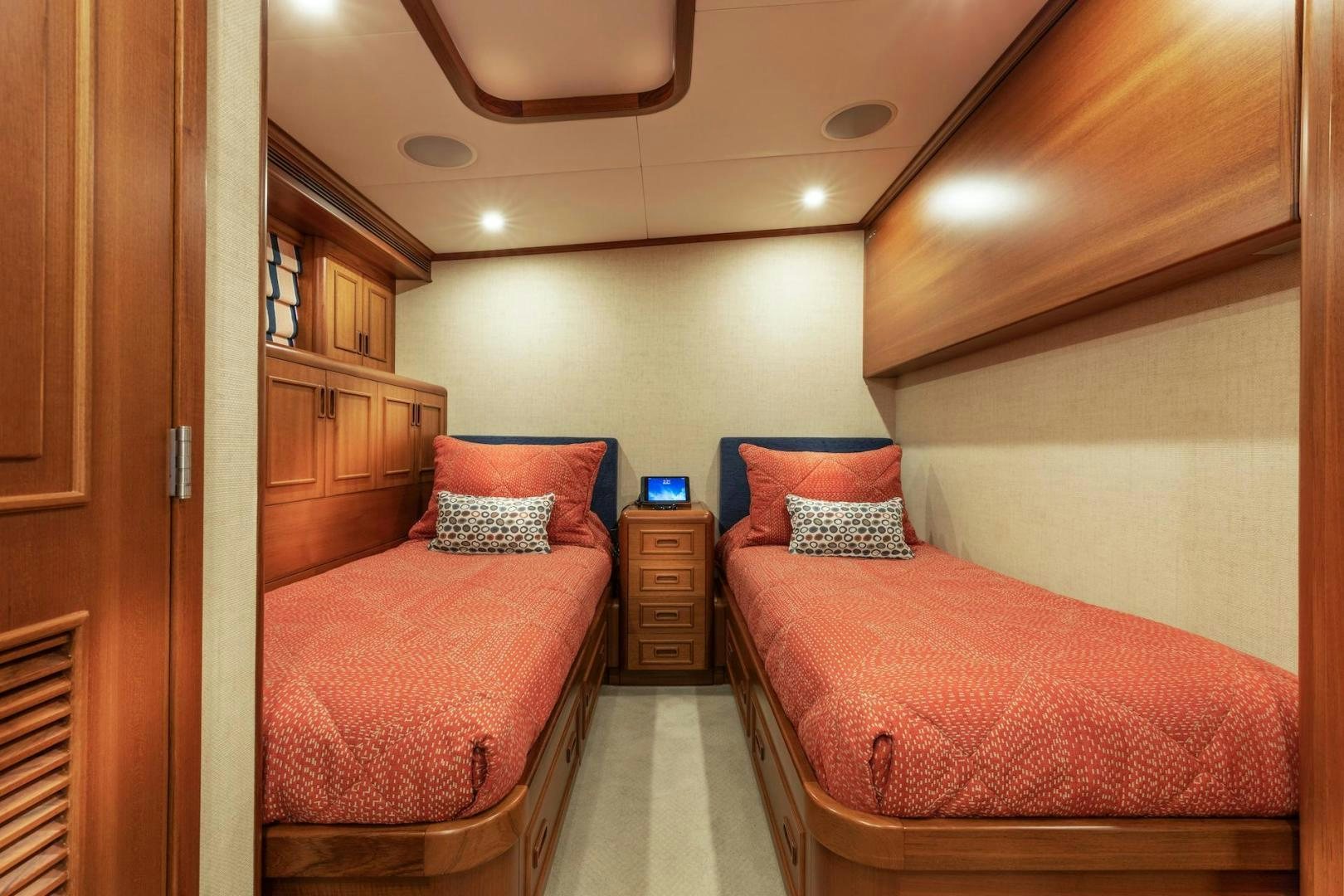 a bedroom with two beds aboard CATCH Yacht for Sale