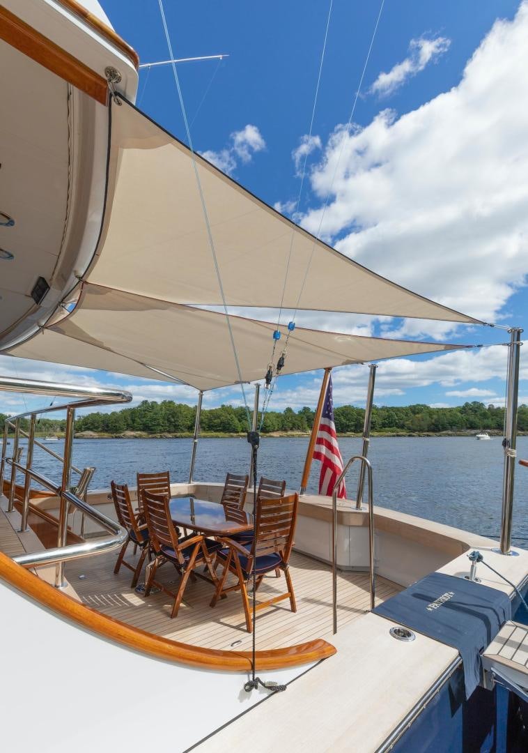 a boat with chairs on it aboard CATCH Yacht for Sale