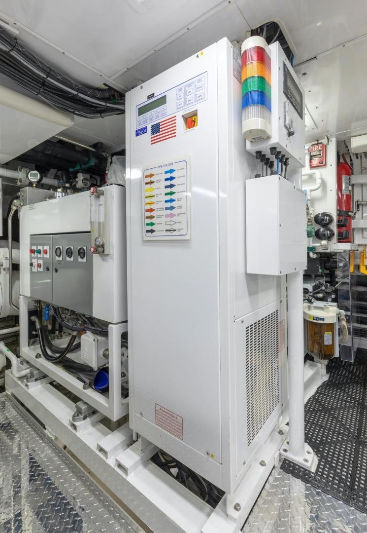 a machine in a room aboard CATCH Yacht for Sale