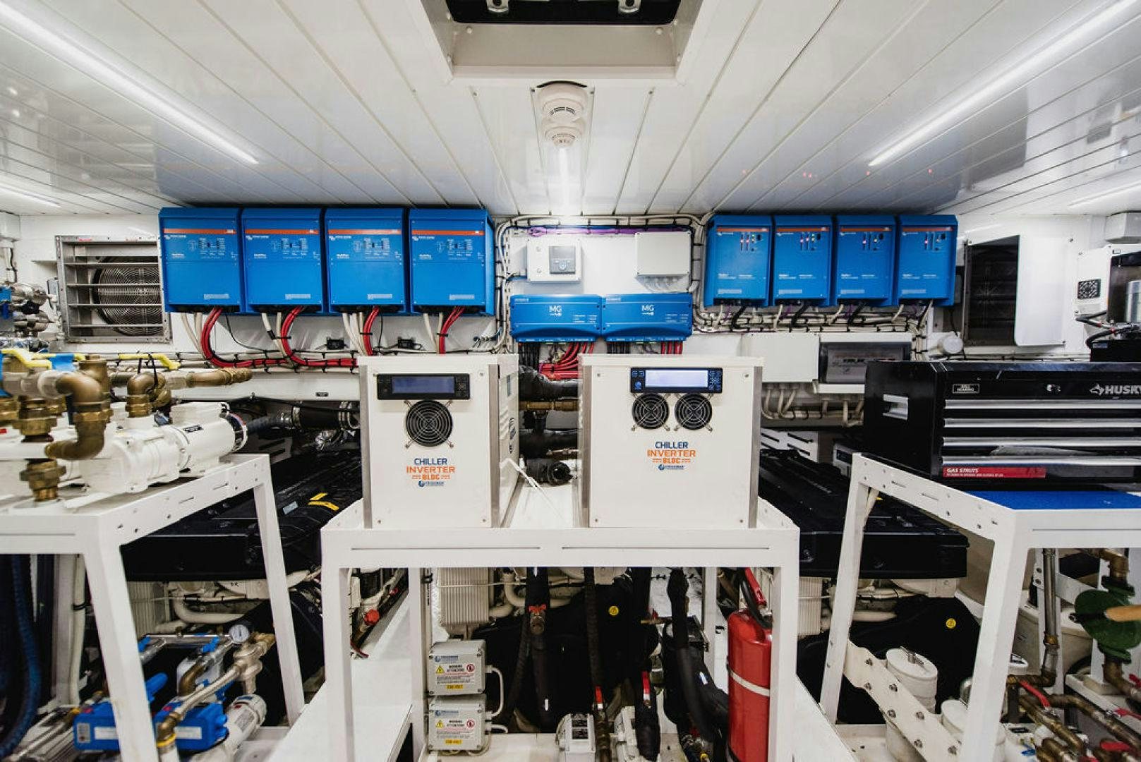 a room with several computers and other electronic devices aboard ZAZZAZU II Yacht for Sale