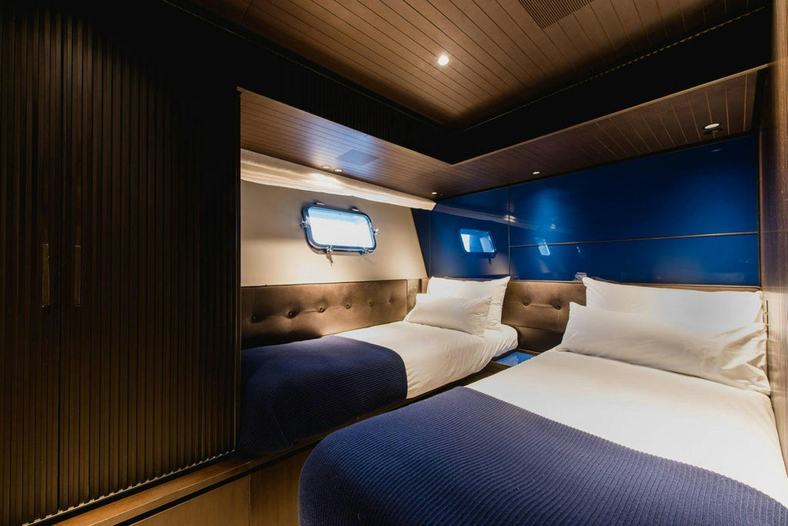 a room with two beds aboard ZAZZAZU II Yacht for Sale
