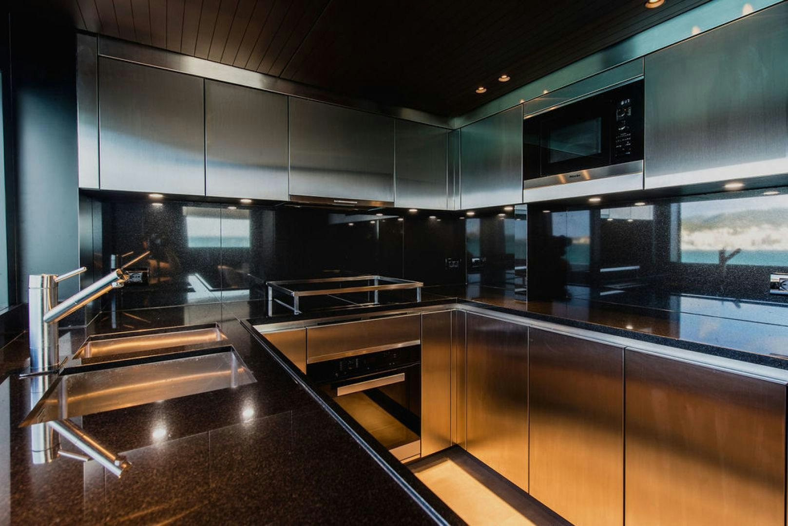 a kitchen with a large counter aboard ZAZZAZU II Yacht for Sale