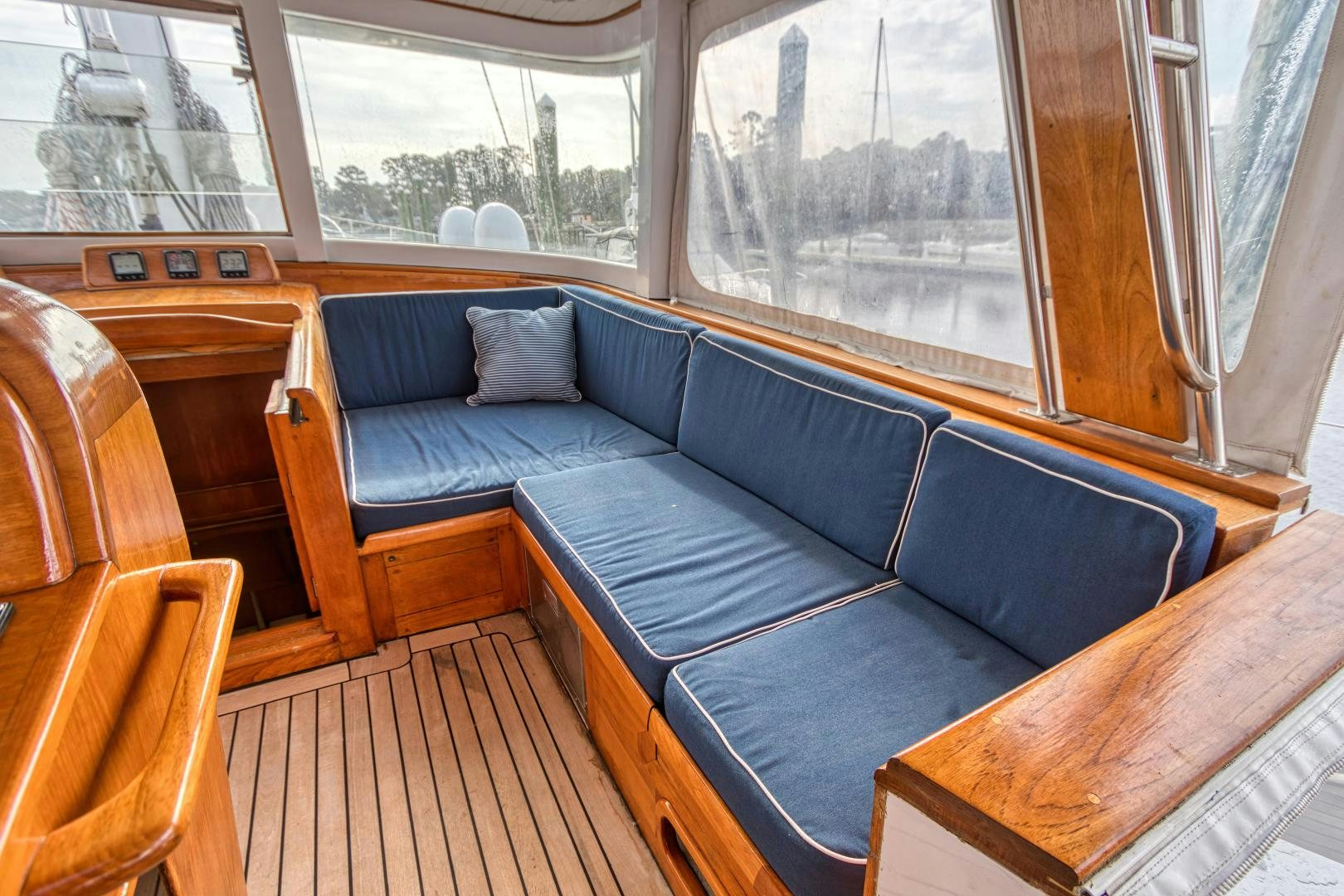 a couch in a train aboard ARIA Yacht for Sale