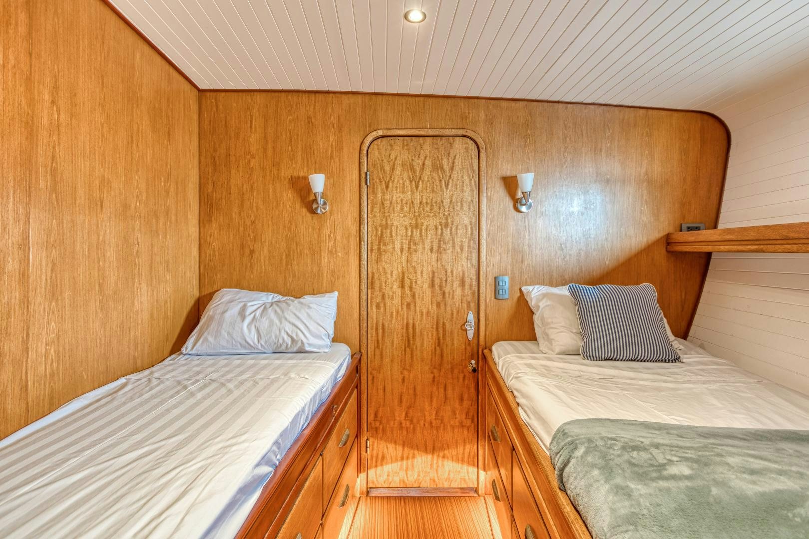 a room with two beds aboard ARIA Yacht for Sale