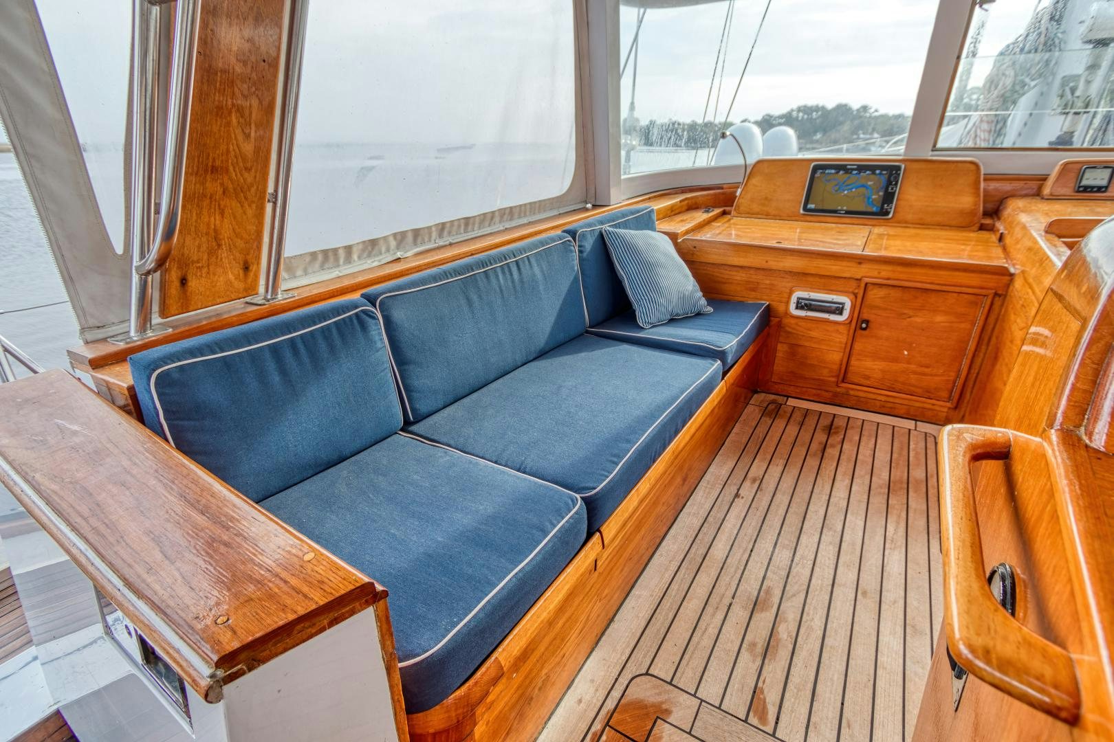 a couch in a room aboard ARIA Yacht for Sale