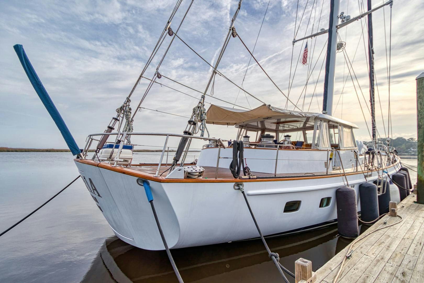 a boat docked at a pier aboard ARIA Yacht for Sale