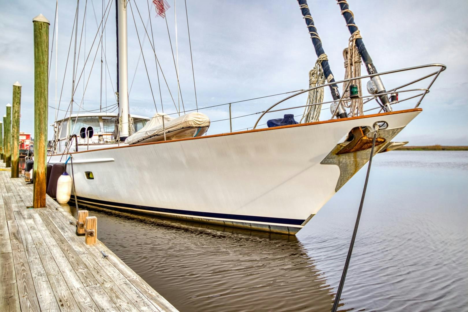 a boat docked at a pier aboard ARIA Yacht for Sale