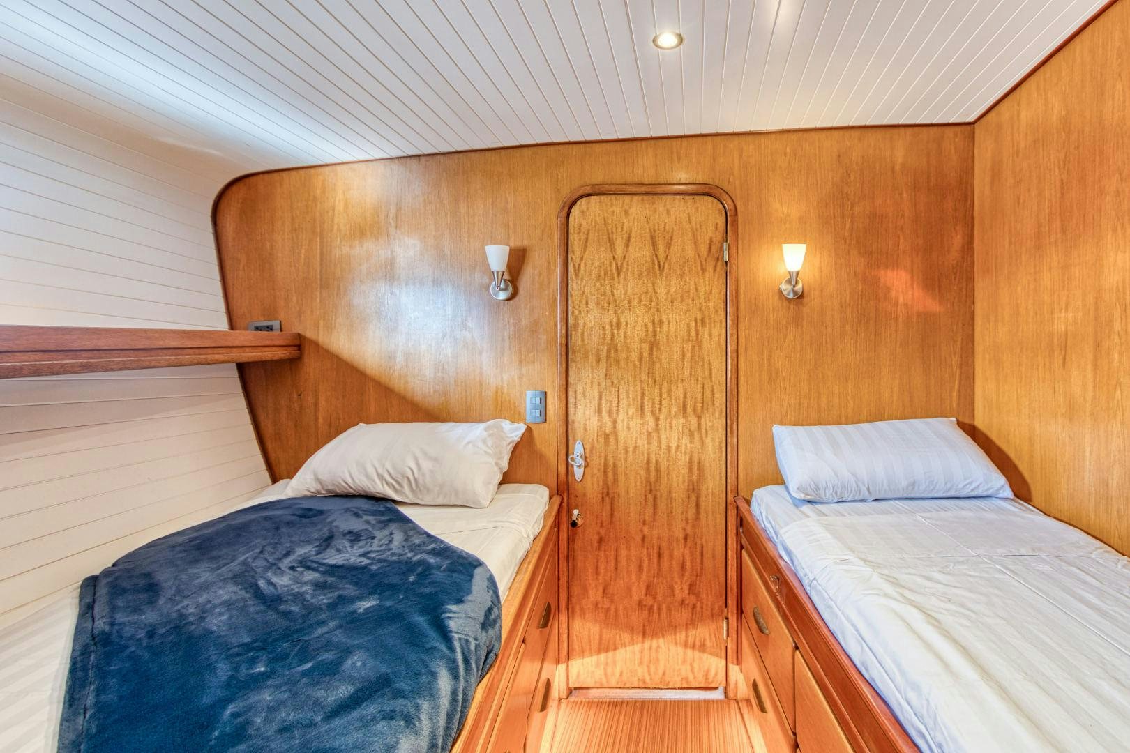 a room with two beds aboard ARIA Yacht for Sale