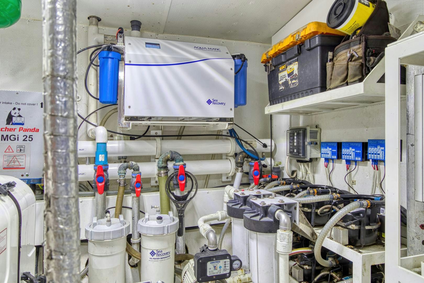 a room with several machines aboard ARIA Yacht for Sale