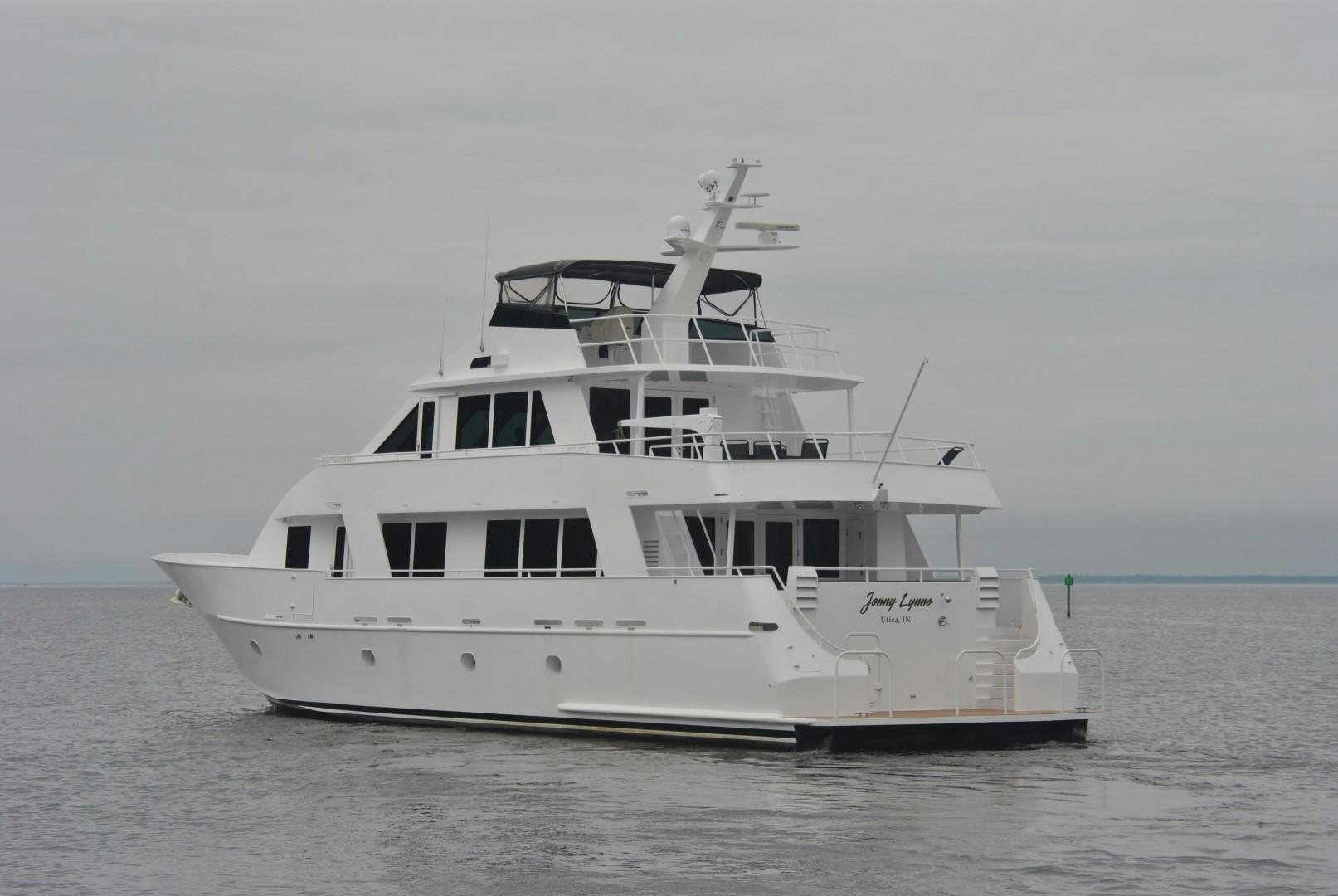 a white boat in the water aboard JENNY LYNNE Yacht for Sale