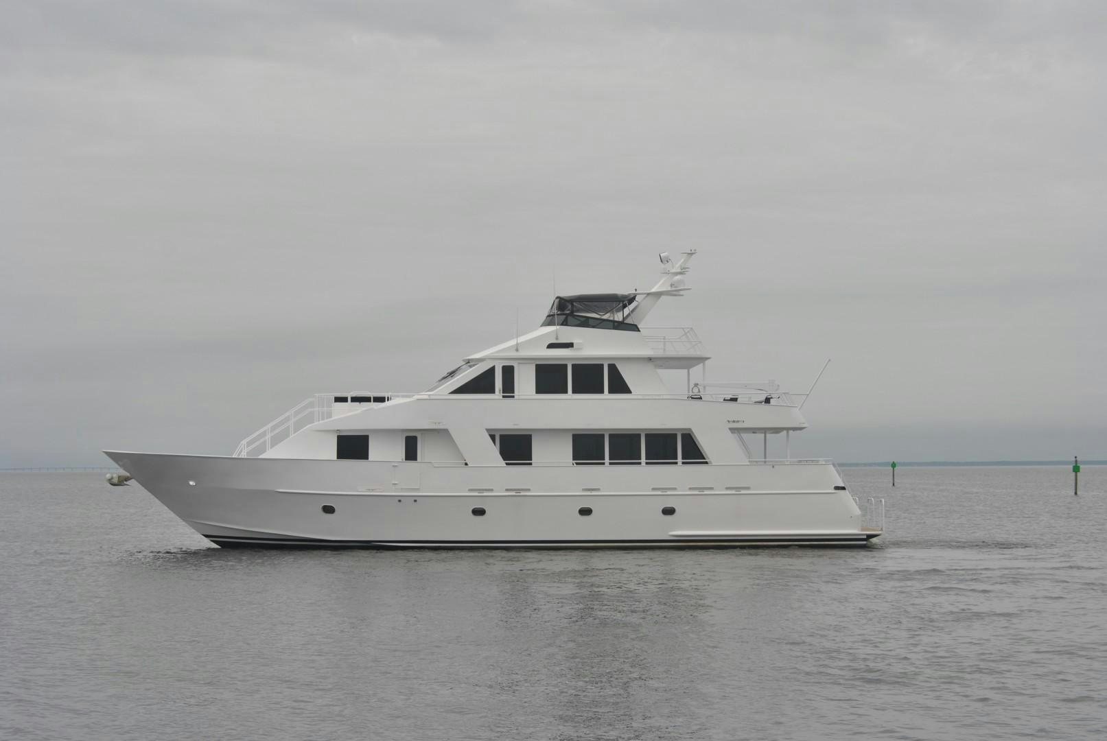 a white yacht in the water aboard JENNY LYNNE Yacht for Sale