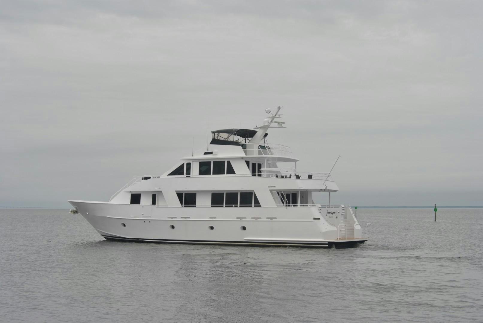 a white boat in the water aboard JENNY LYNNE Yacht for Sale