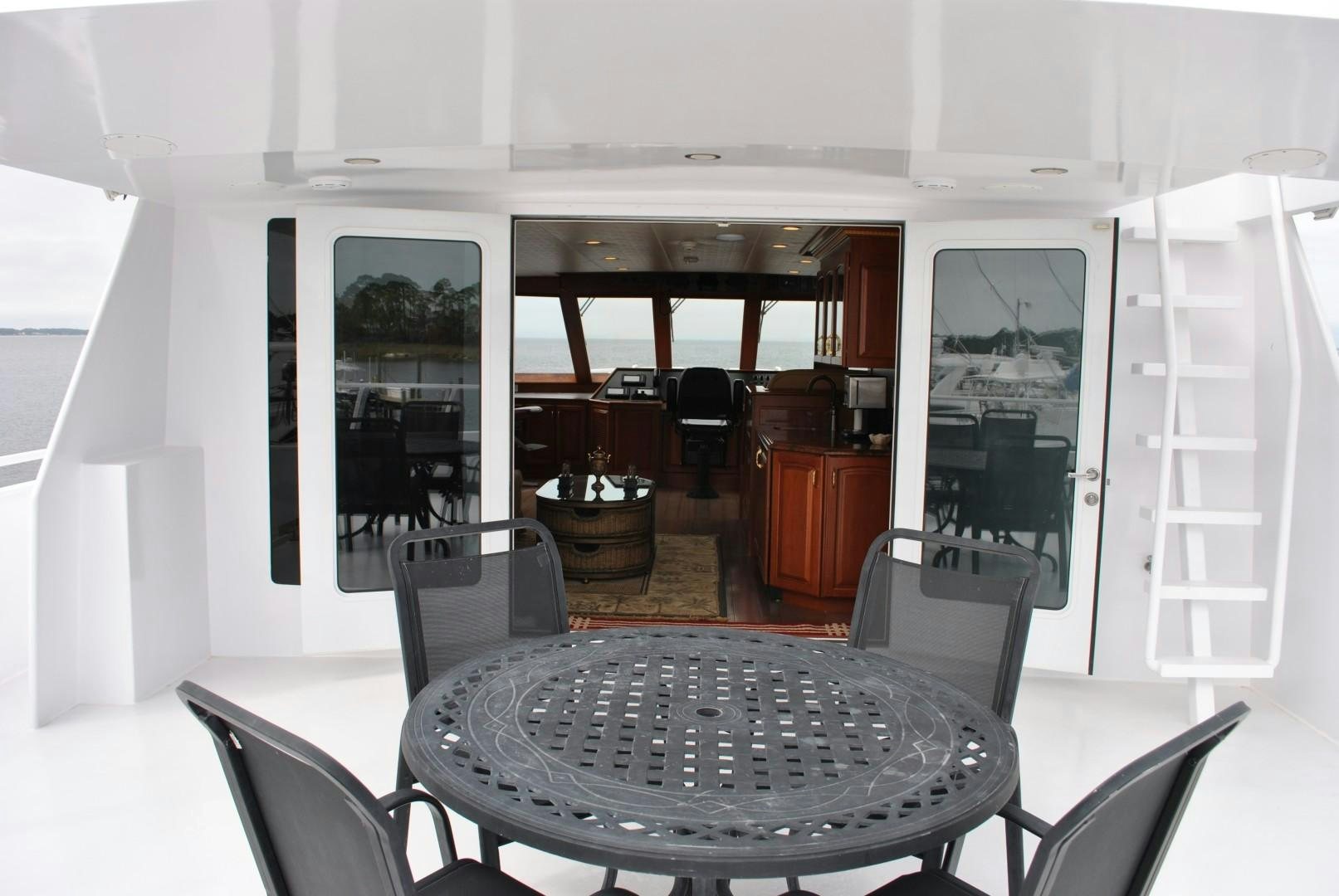 a dining room table aboard JENNY LYNNE Yacht for Sale