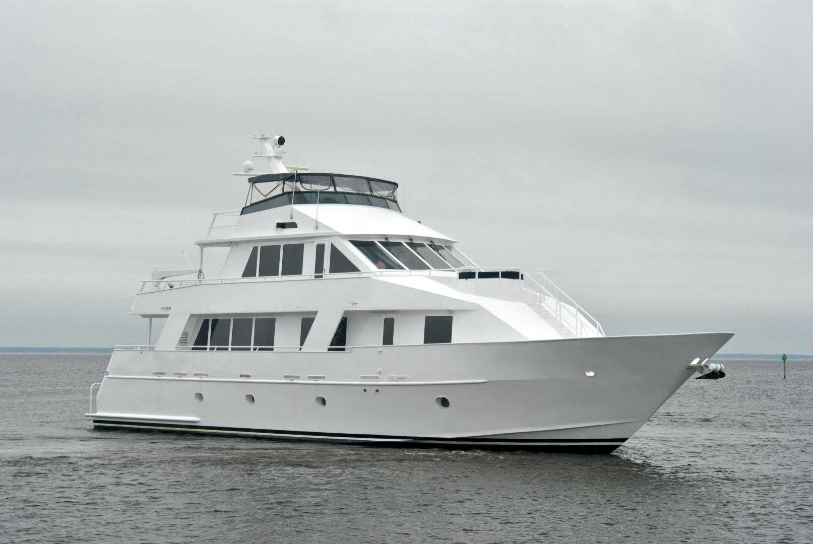 a white yacht on the water aboard JENNY LYNNE Yacht for Sale