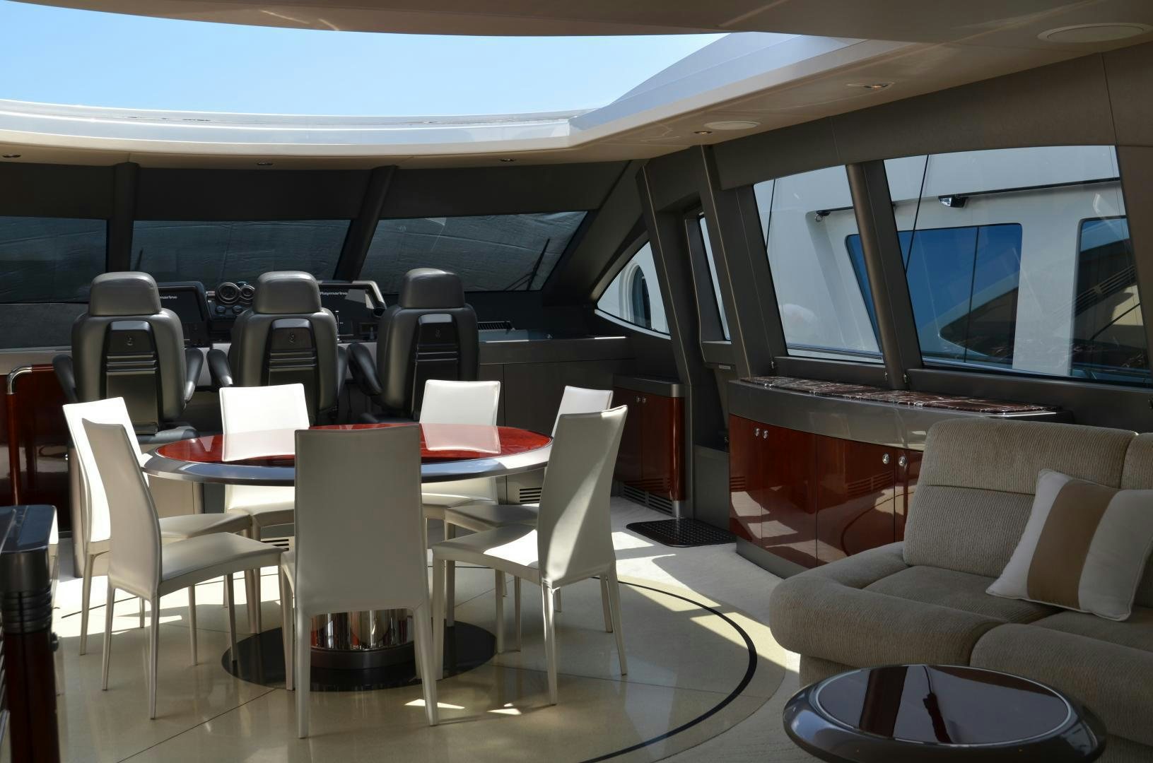 a room with chairs and tables aboard ANDIAMO Yacht for Sale