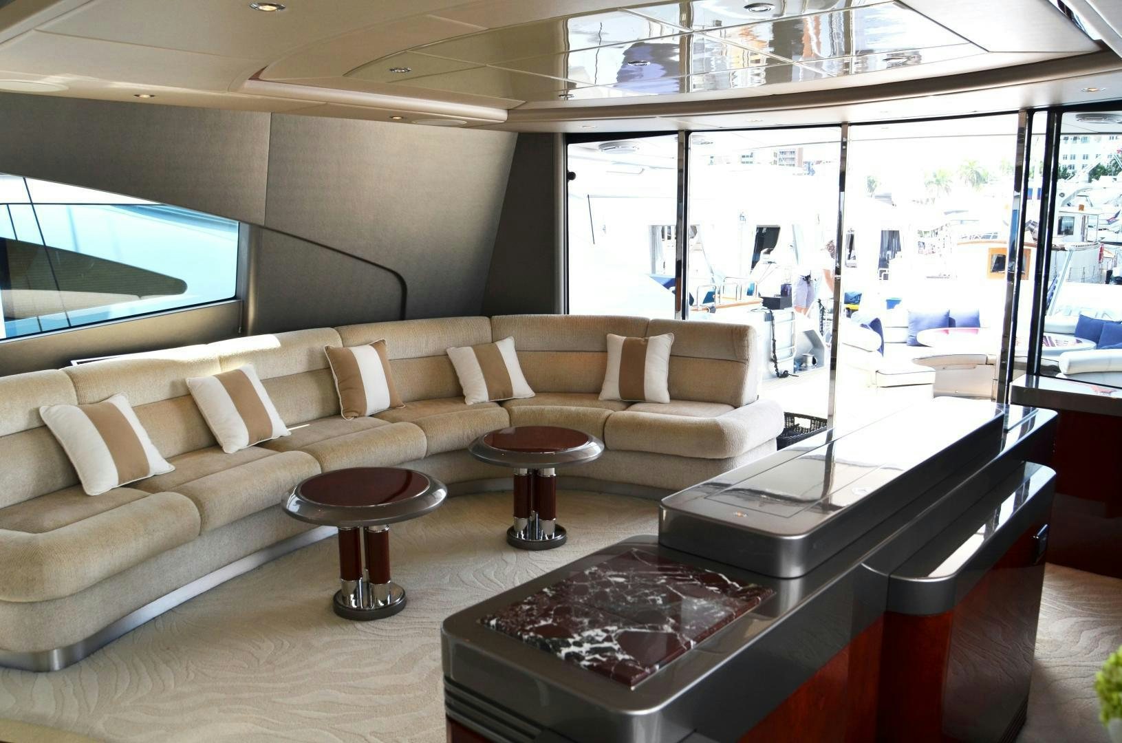 a room with a couch and a table aboard ANDIAMO Yacht for Sale