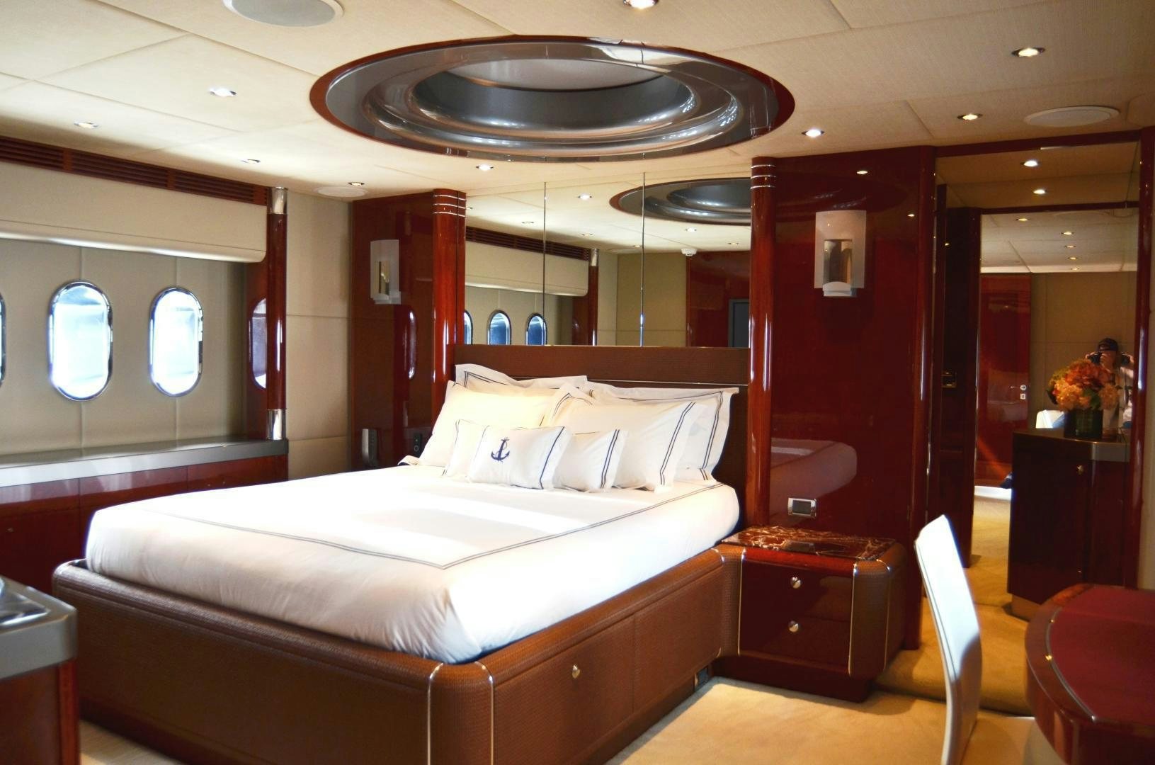 a bed in a room aboard ANDIAMO Yacht for Sale