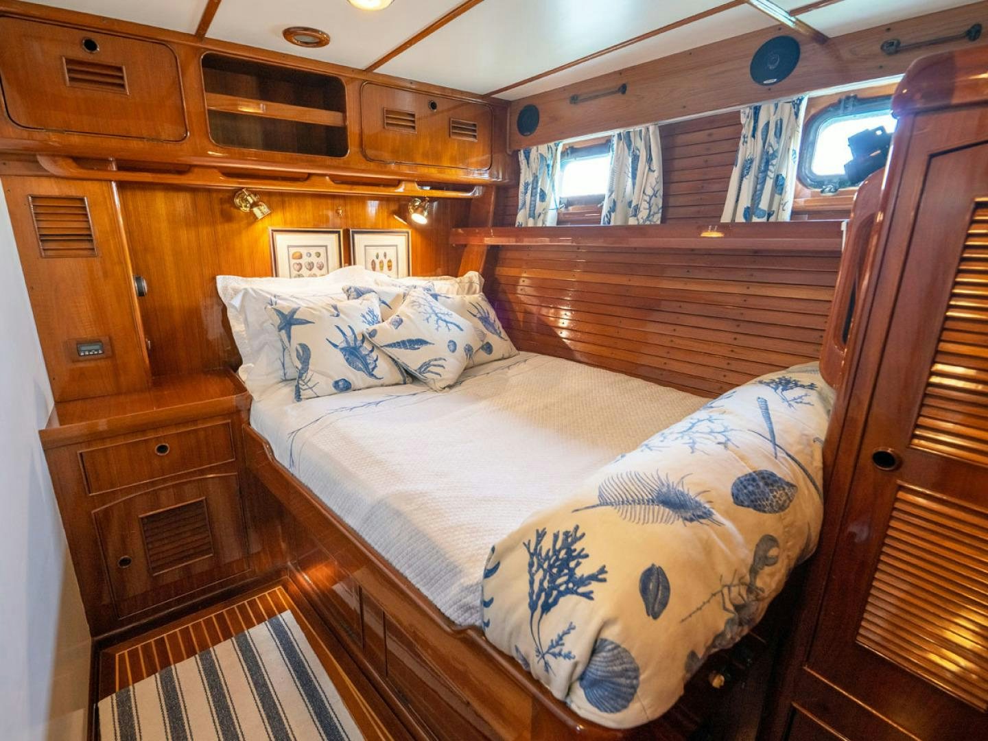 a cabin with a bed aboard HERMIE LOUISE Yacht for Sale