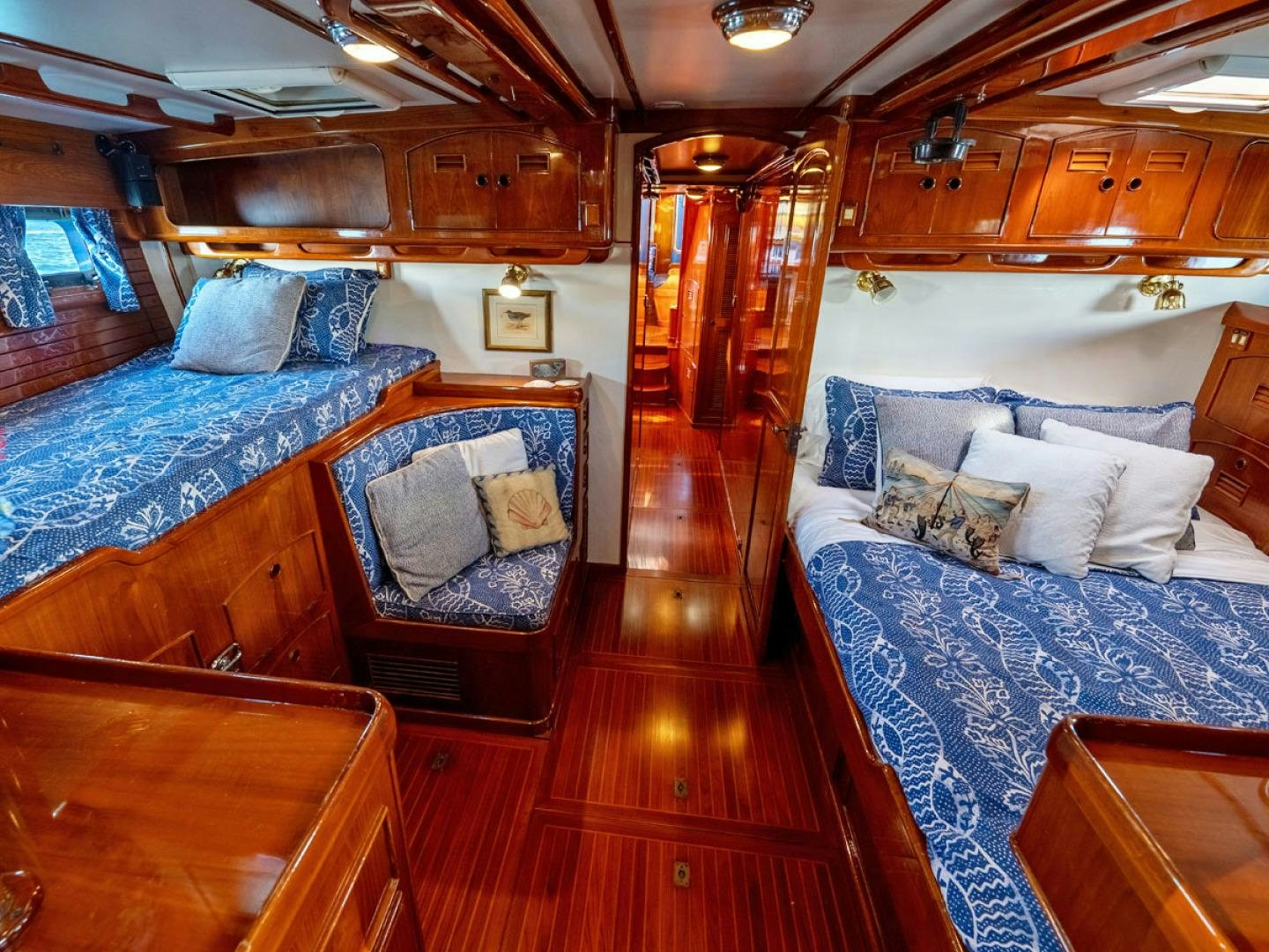 a room with wooden furniture aboard HERMIE LOUISE Yacht for Sale