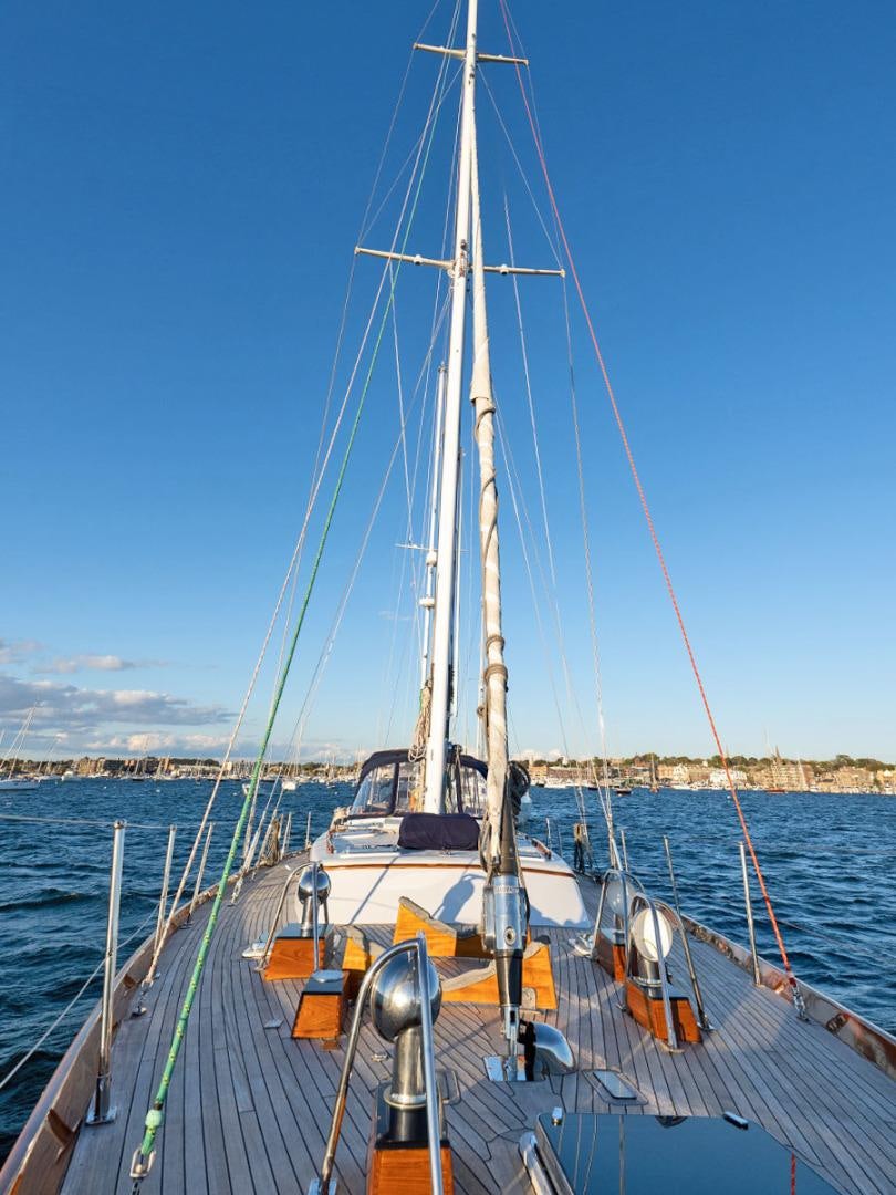 a sailboat on a dock aboard HERMIE LOUISE Yacht for Sale