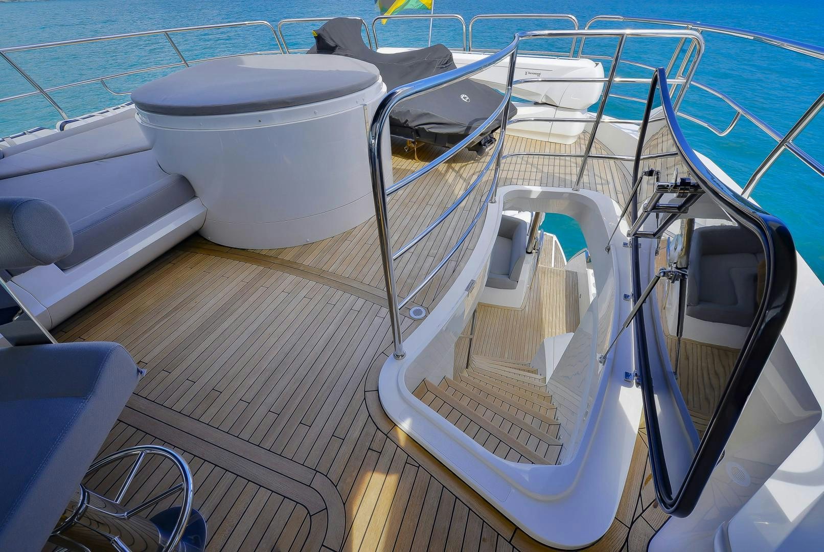 a white toilet on a boat aboard PURA VIDA Yacht for Sale