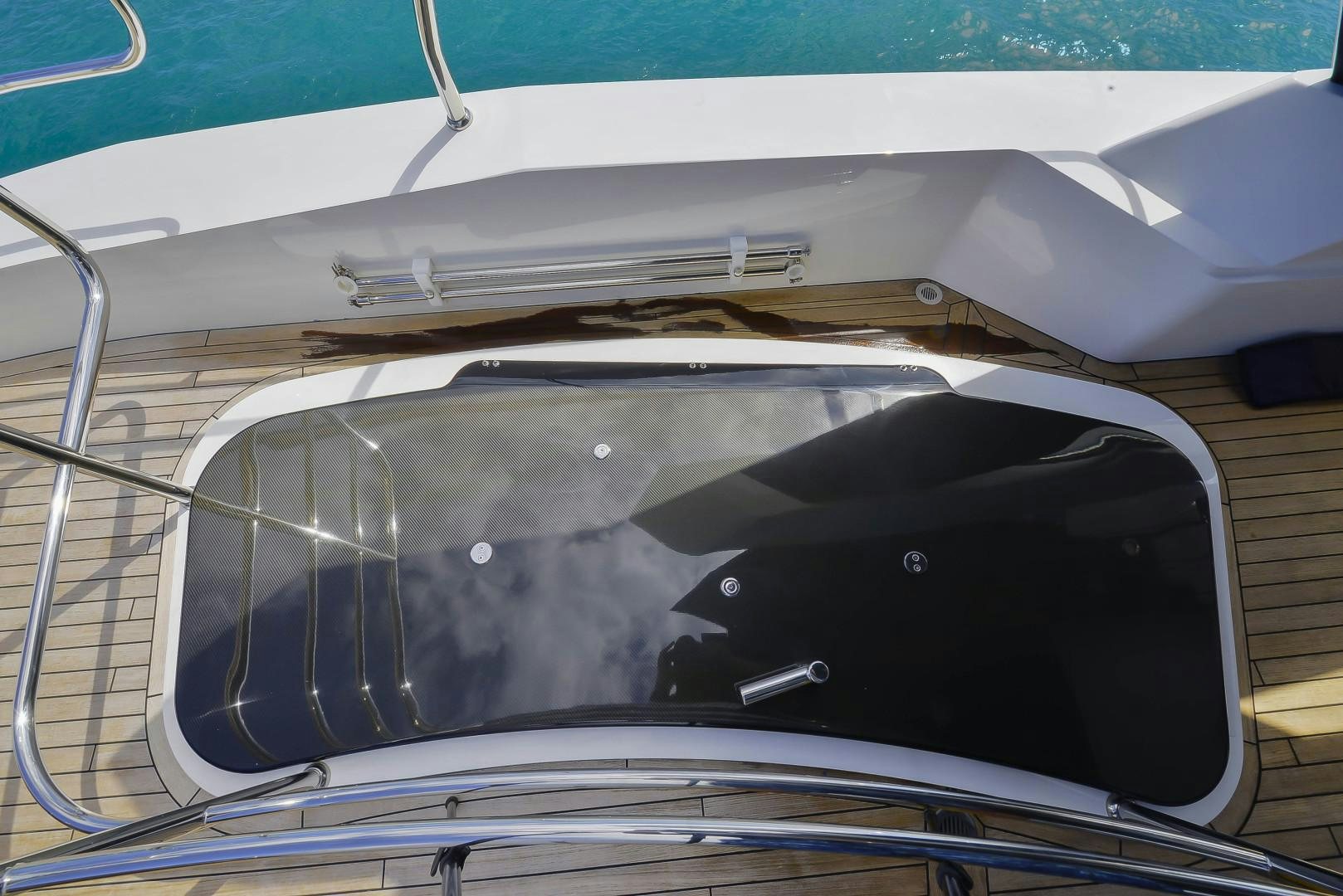 a cat sitting in a car aboard PURA VIDA Yacht for Sale