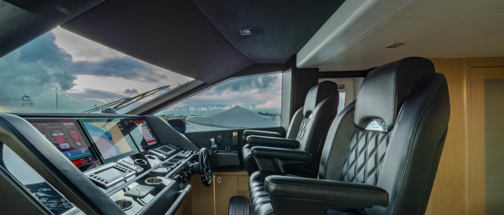 the inside of a car aboard PURA VIDA Yacht for Sale