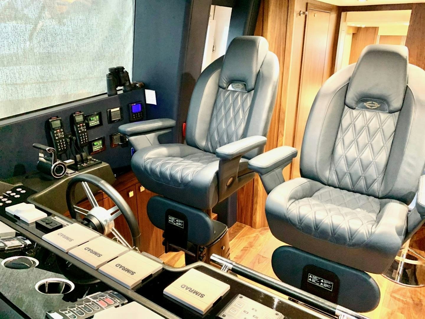 a chair and desk with a computer aboard 'S NOON SOMEWHERE Yacht for Sale