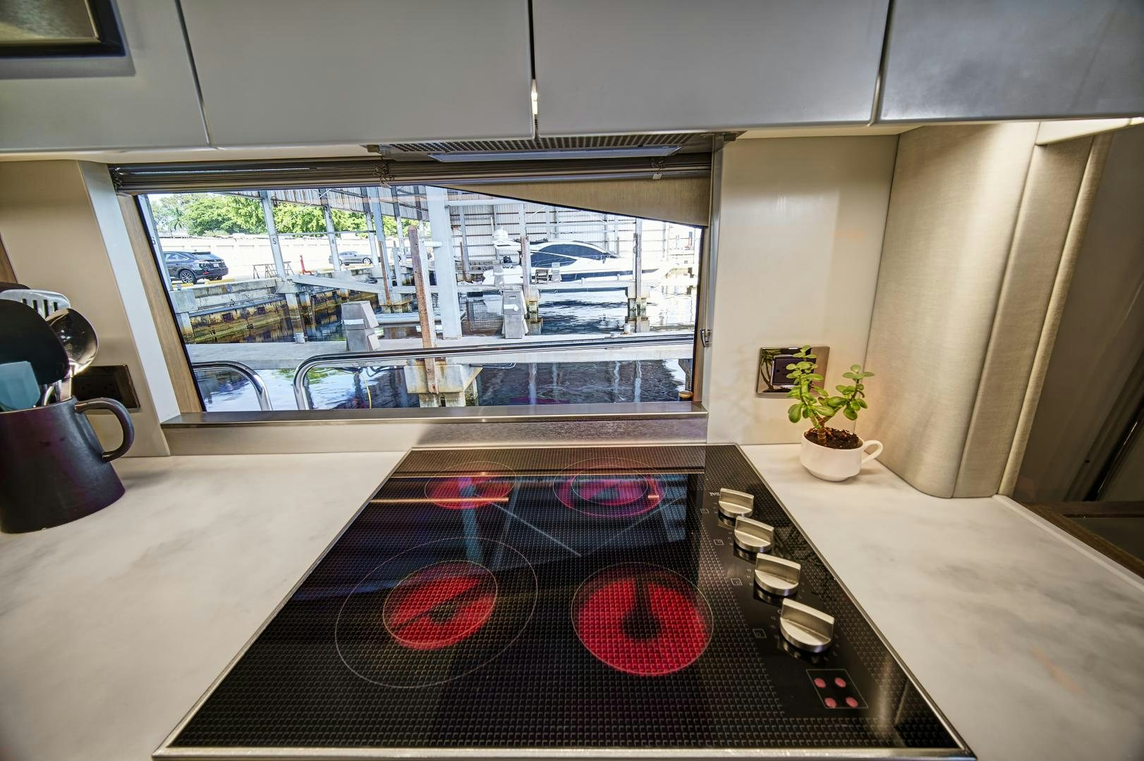 a room with a large window aboard 'S NOON SOMEWHERE Yacht for Sale