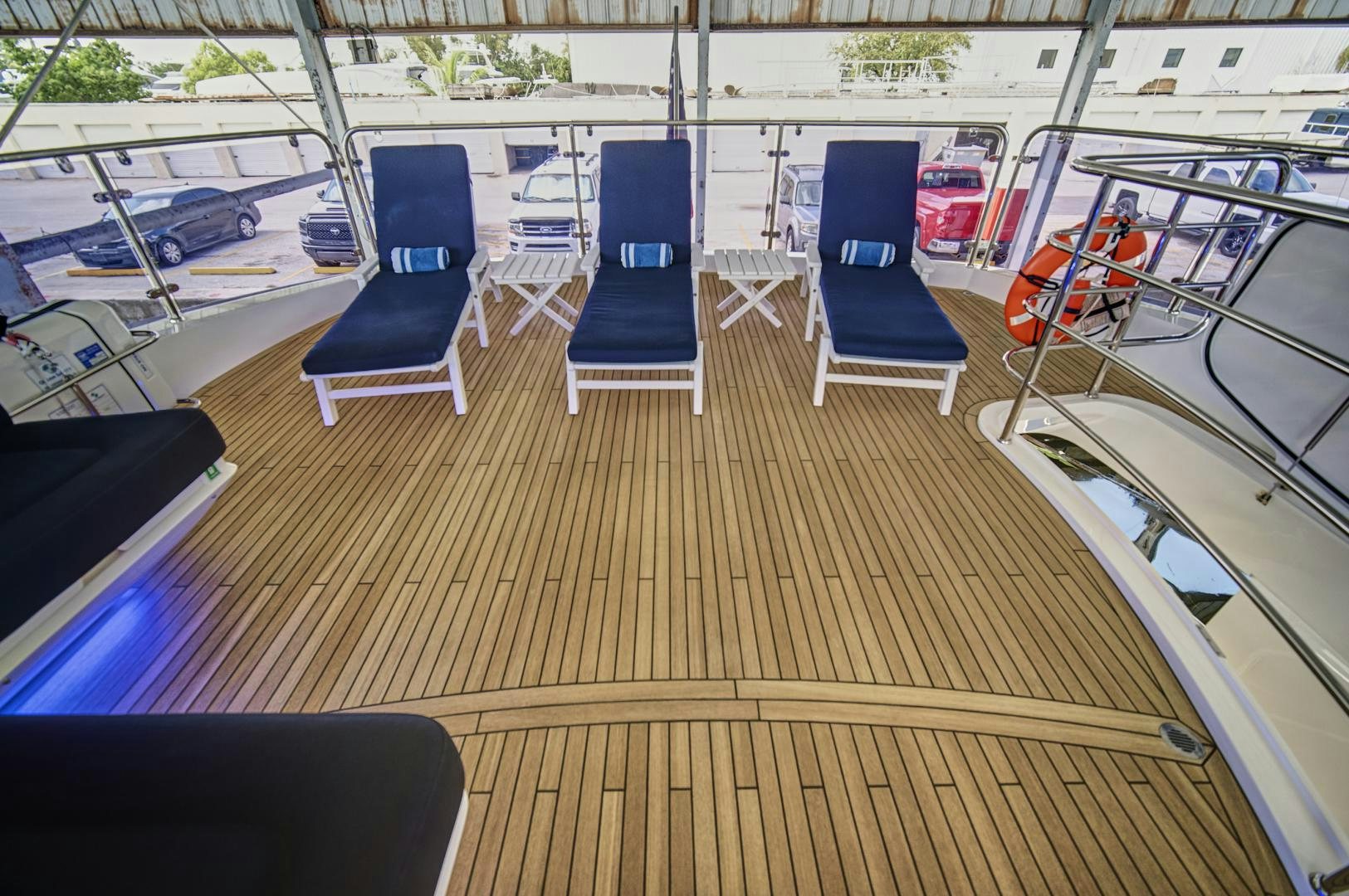 a room with chairs and tables aboard 'S NOON SOMEWHERE Yacht for Sale