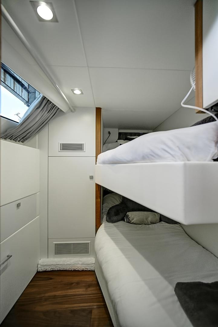 a room with two beds aboard 'S NOON SOMEWHERE Yacht for Sale
