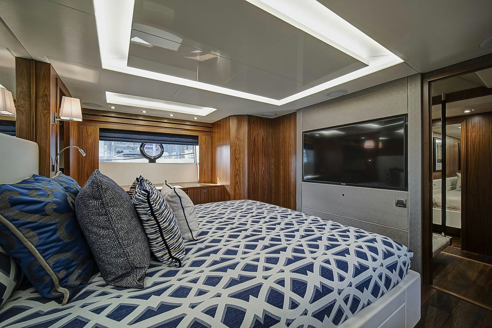a bed in a room aboard 'S NOON SOMEWHERE Yacht for Sale