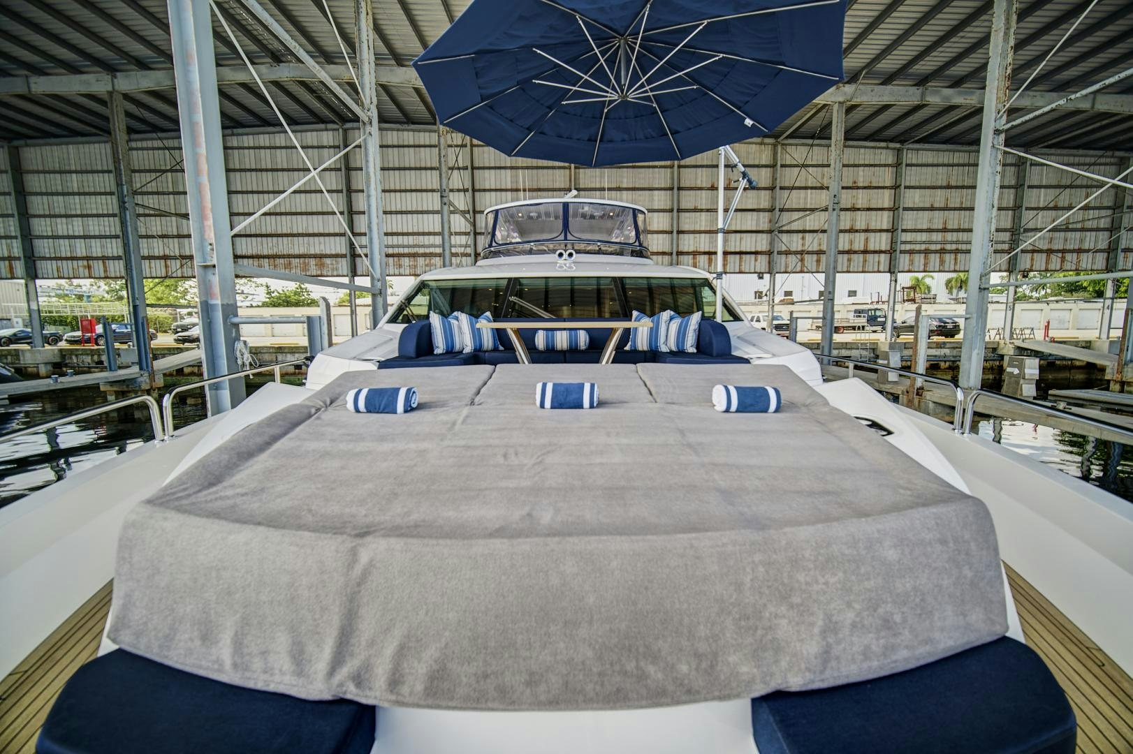 a car parked in a building aboard 'S NOON SOMEWHERE Yacht for Sale