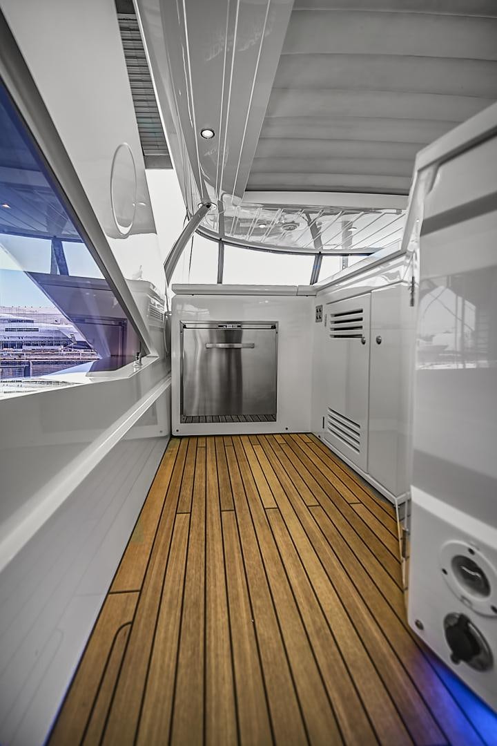 a room with a large window and a large metal door aboard 'S NOON SOMEWHERE Yacht for Sale