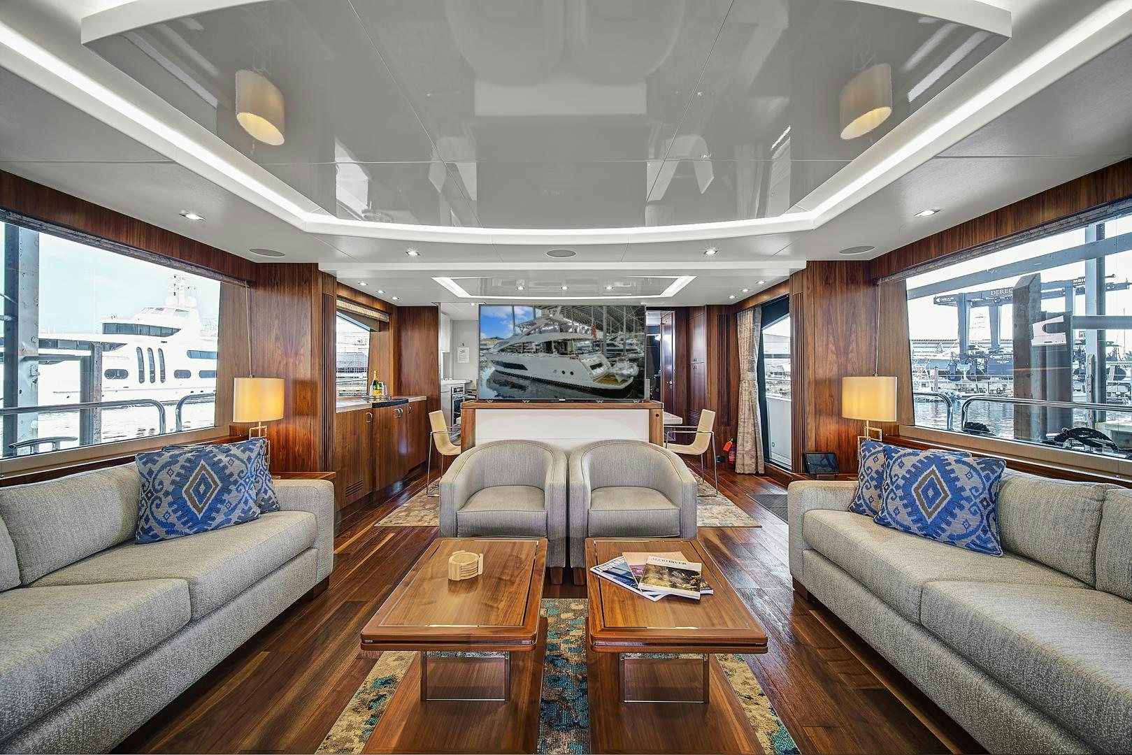 a living room with a large window aboard 'S NOON SOMEWHERE Yacht for Sale