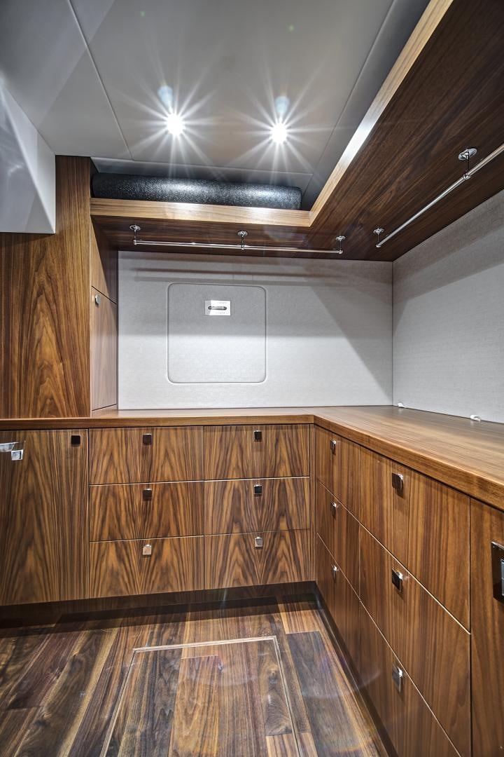 a room with wooden cabinets aboard 'S NOON SOMEWHERE Yacht for Sale