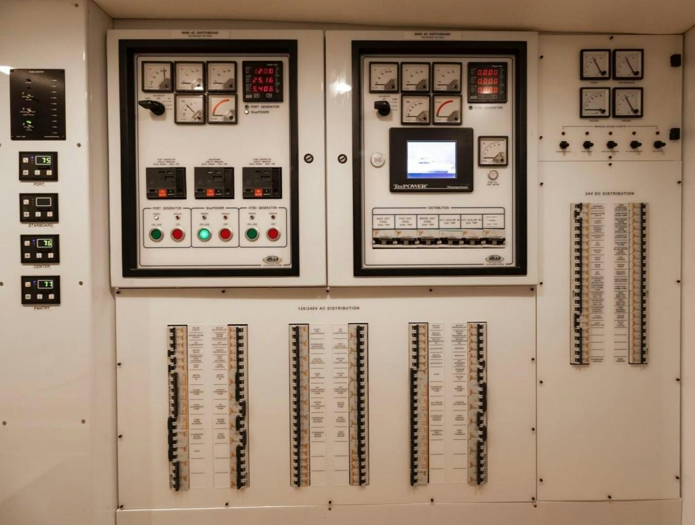 a wall with pictures and pictures on it aboard DESTINY Yacht for Sale