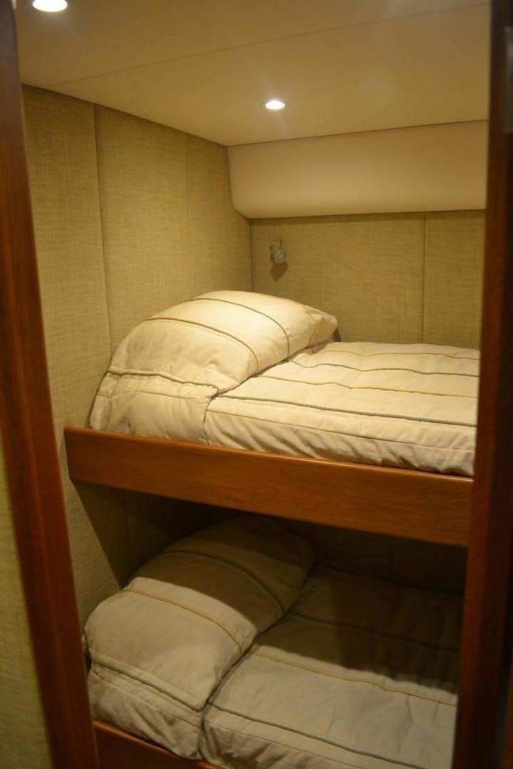 a couple of beds in a room aboard DESTINY Yacht for Sale