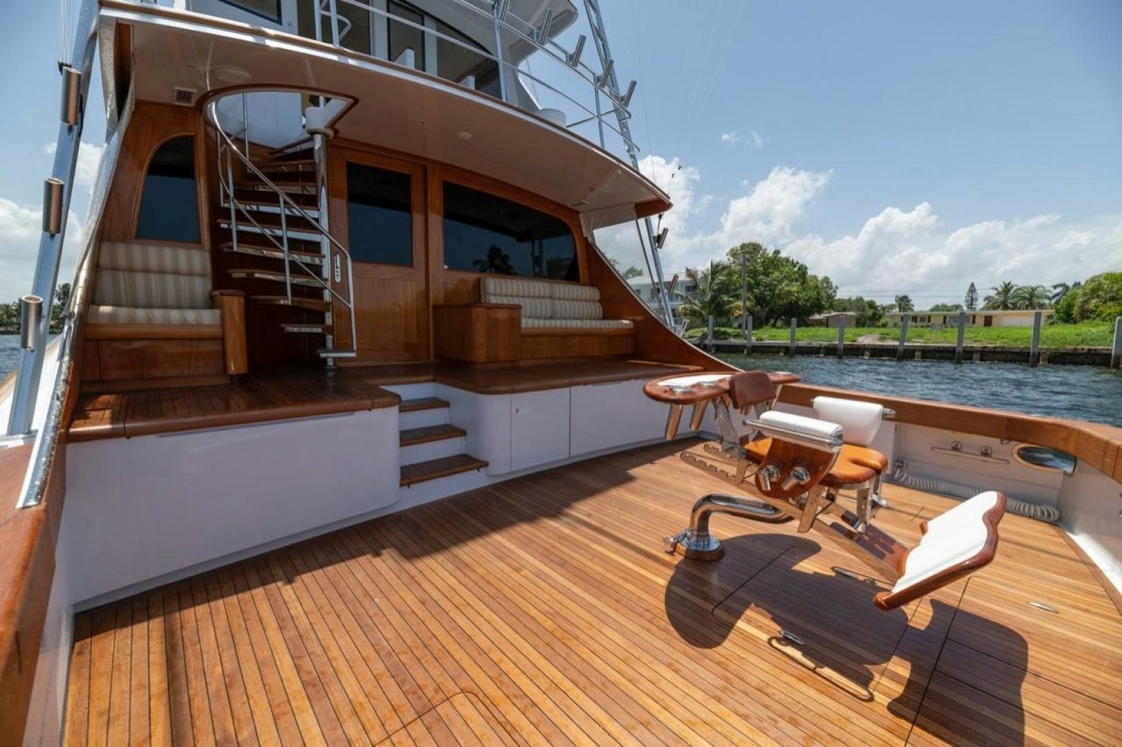 a deck with a deck and chairs aboard DESTINY Yacht for Sale