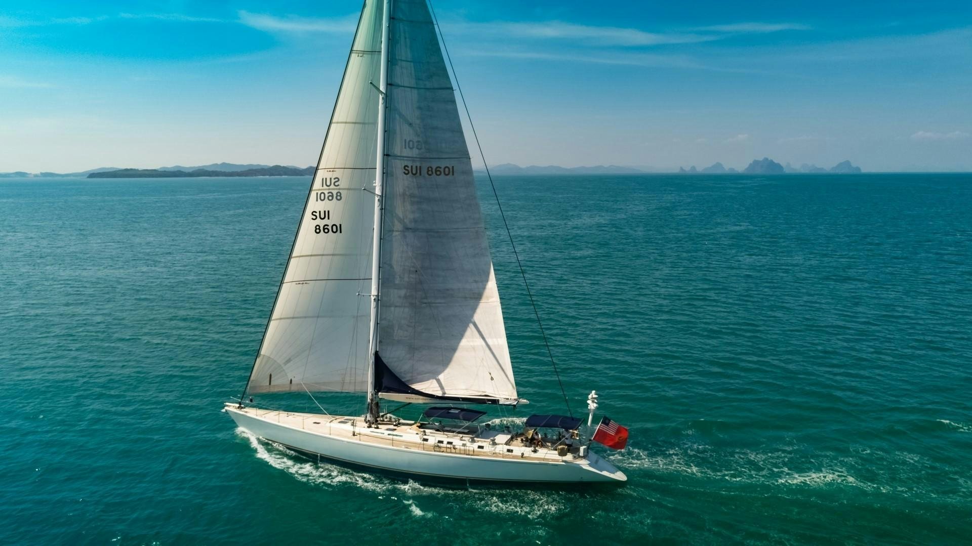 a sailboat in the water aboard ASPIRATION Yacht for Sale
