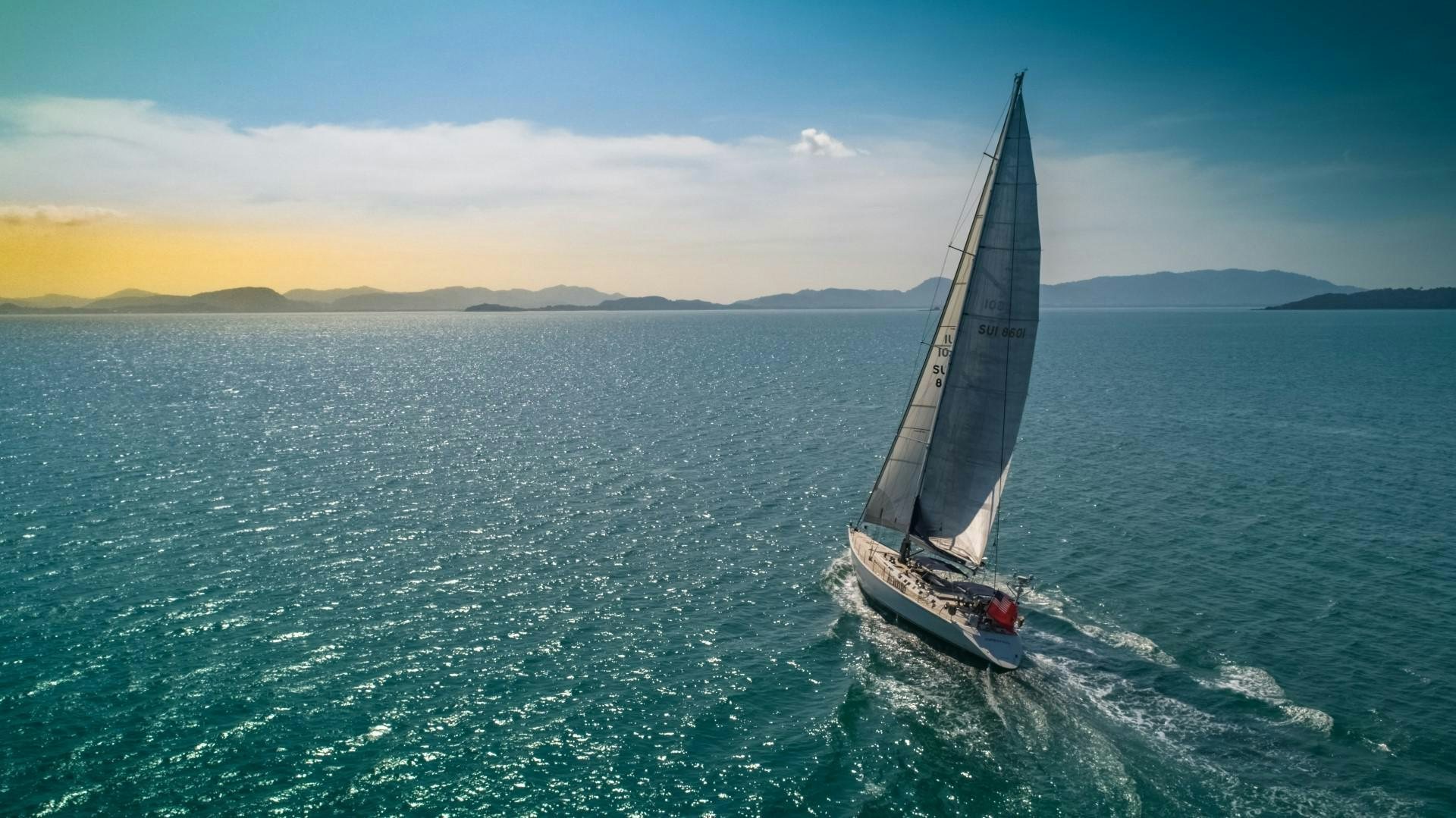a sailboat on the water aboard ASPIRATION Yacht for Sale