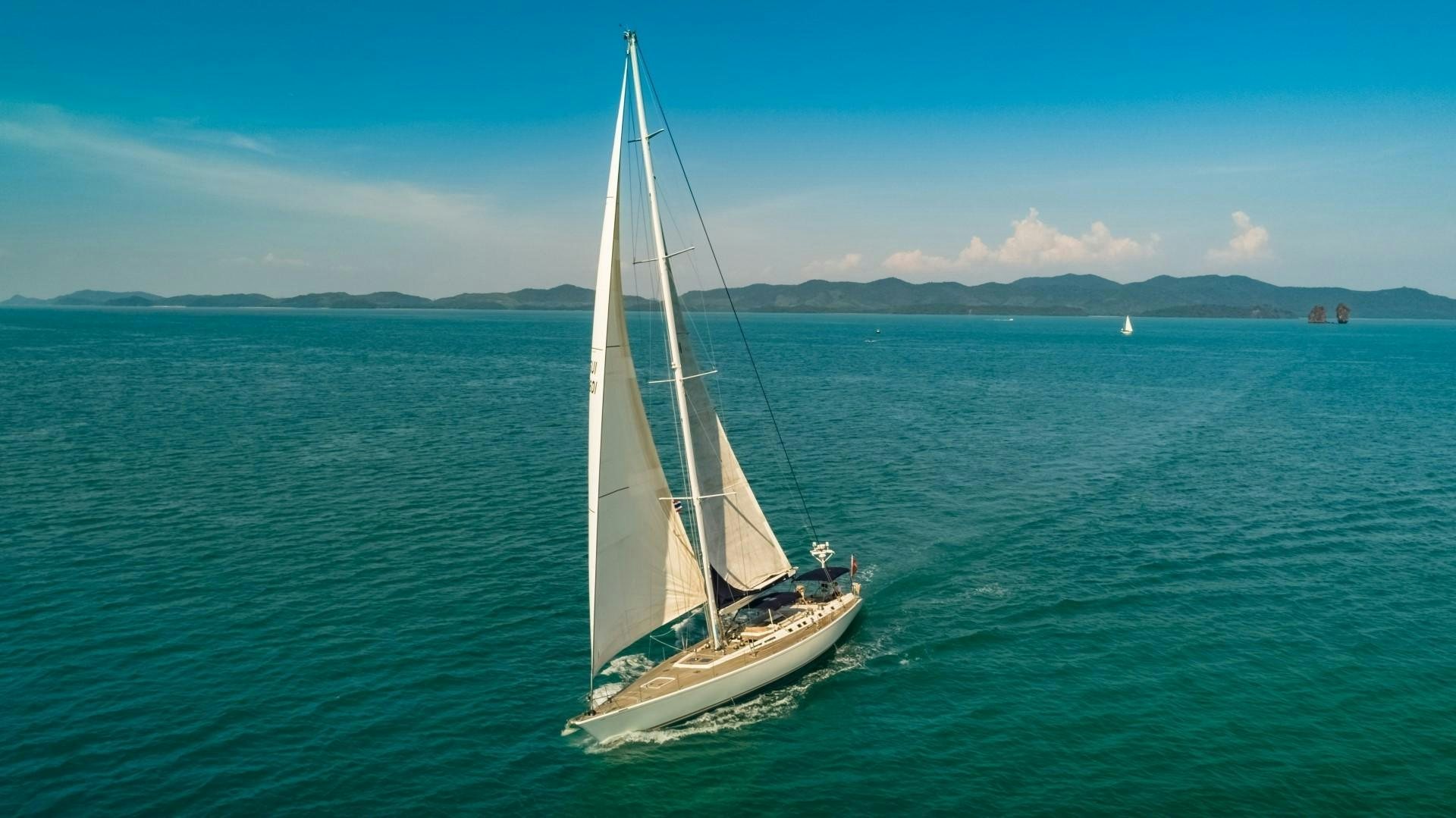 a sailboat in the water aboard ASPIRATION Yacht for Sale