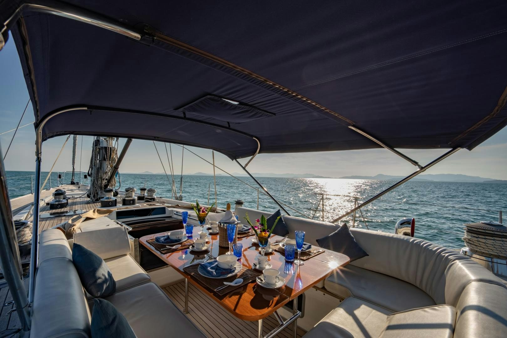 a table set for a meal on a boat aboard ASPIRATION Yacht for Sale