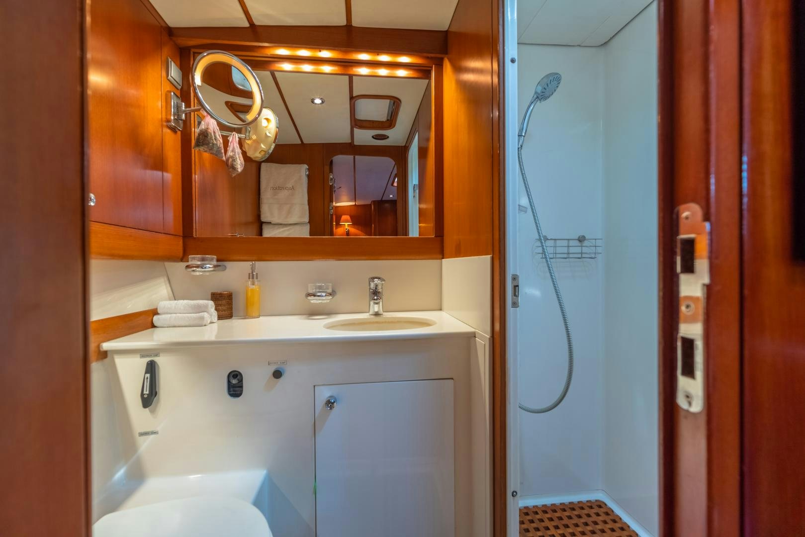 a bathroom with a sink and a shower aboard ASPIRATION Yacht for Sale