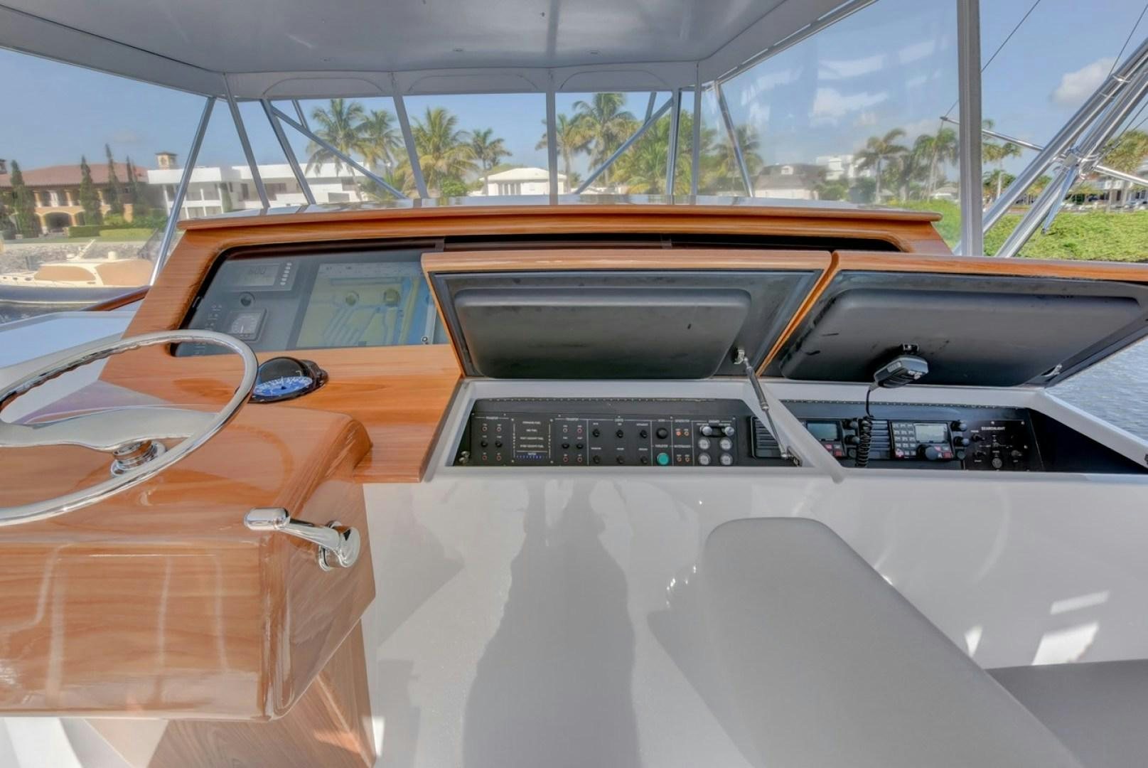 the inside of a car aboard III AMIGOS Yacht for Sale