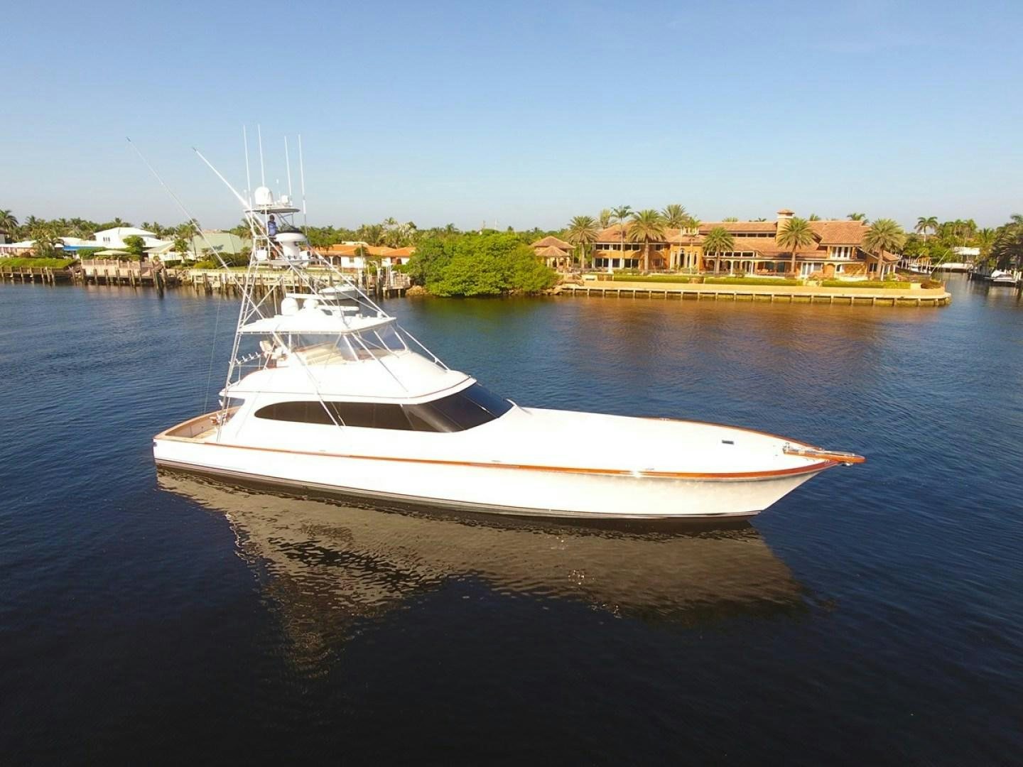 a boat on the water aboard III AMIGOS Yacht for Sale