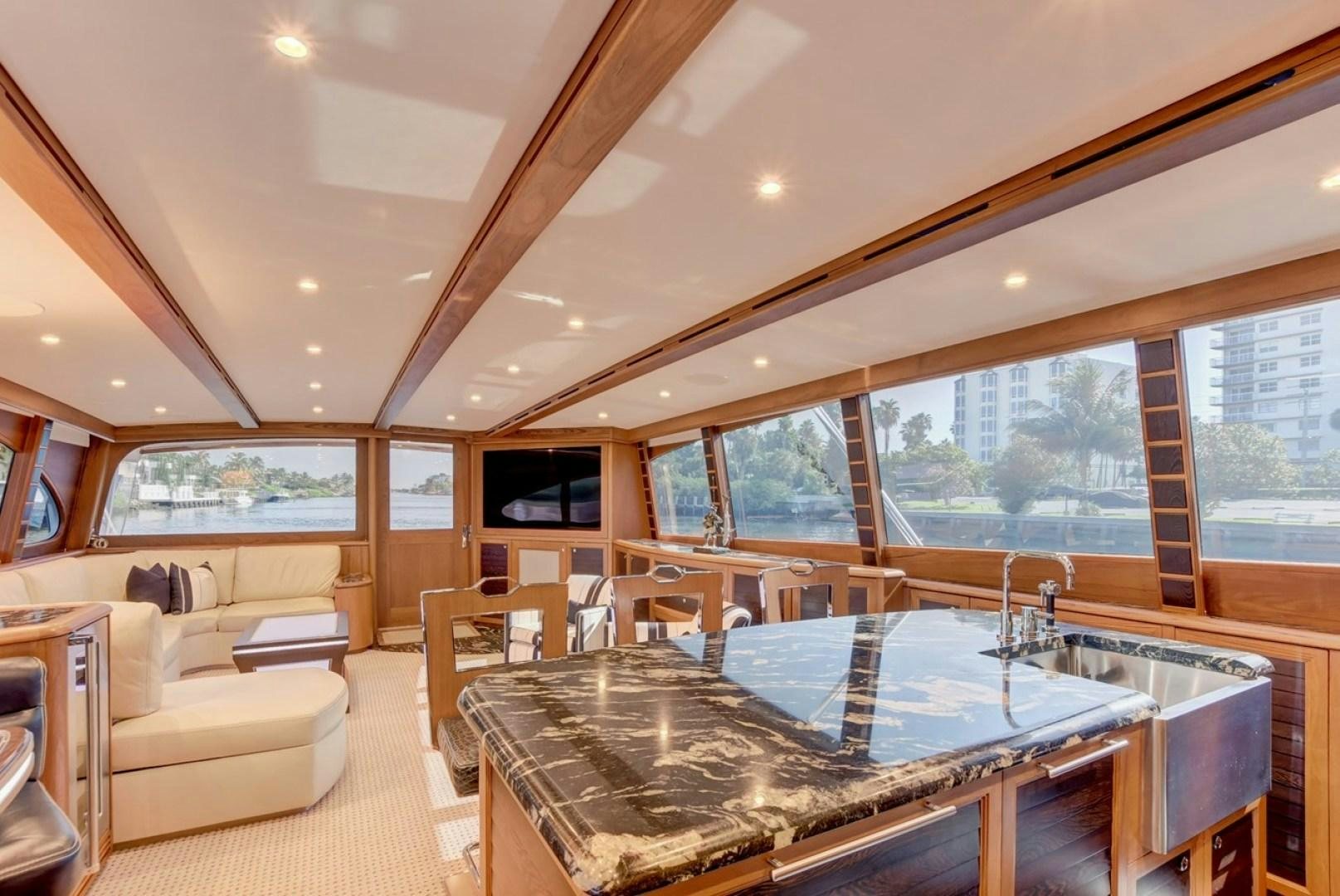 a large living room with a large pool table aboard III AMIGOS Yacht for Sale
